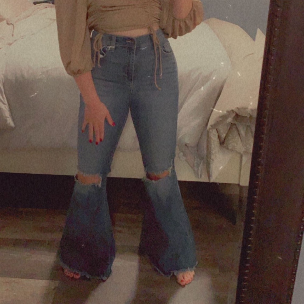 High rise ripped bell bottom jeans